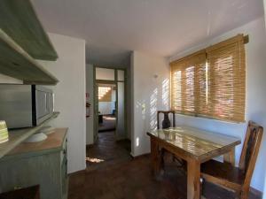 Kuchyň nebo kuchyňský kout v ubytování Casa Árbol Hotel