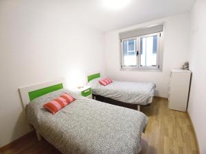 Postel nebo postele na pokoji v ubytování Camiño Vello