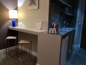 Kuchyňa alebo kuchynka v ubytovaní Hotel Calypso