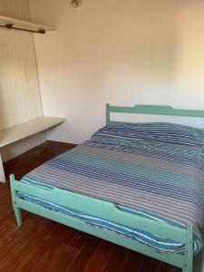 Postel nebo postele na pokoji v ubytování DUPLEX EN PLENO CENTRO DE MAR DE AJO