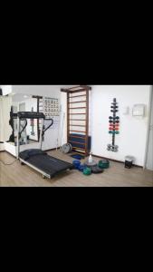 a room with a gym with a treadmill at Flat Beira Mar de Tambaú apto 206 in João Pessoa