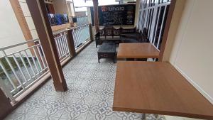 Posezení v ubytování Homestay HUMAIRA DIENG villa full house 3 kamar,6 bed,dapur,ruang tamu,balkon,parkir,wifi