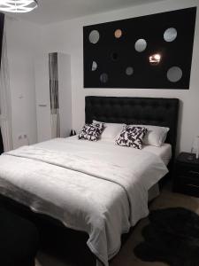 Postel nebo postele na pokoji v ubytování Apartman_Park