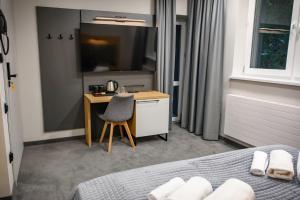 Postel nebo postele na pokoji v ubytování Wójcik SPA - Krynica Zdrój