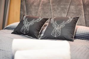 Postel nebo postele na pokoji v ubytování Wójcik SPA - Krynica Zdrój