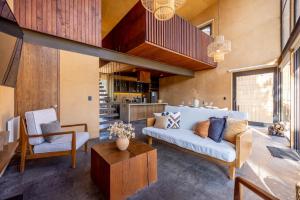 Posezení v ubytování Cabaña Lujo con Alberca Climatizada Vistas al Bosque de Mazamitla