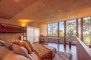 Posezení v ubytování Cabaña Lujo con Alberca Climatizada Vistas al Bosque de Mazamitla