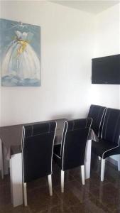 Televízia a/alebo spoločenská miestnosť v ubytovaní Apartments Ewa