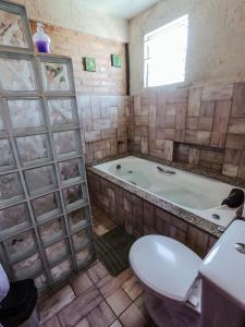 Ванная комната в Pousada Refúgio dos Pássaros