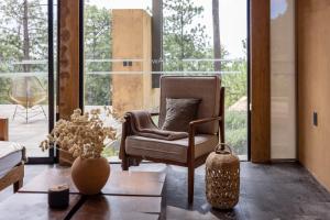 Posezení v ubytování Cabaña Lujo con Alberca Climatizada Vistas al Bosque de Mazamitla