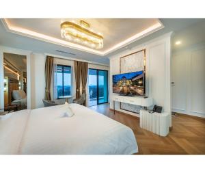 Postel nebo postele na pokoji v ubytování Nine River Hotel