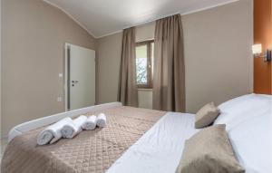 Postel nebo postele na pokoji v ubytování Three-Bedroom Holiday Home In Katun