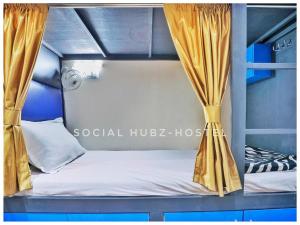 Postel nebo postele na pokoji v ubytování Social Hubz Hostel