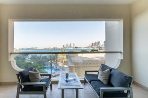 Fotografie z fotogalerie ubytování Baytik- Stunning 1BR Apartment Shoreline Palm Jumeirah v Dubaji
