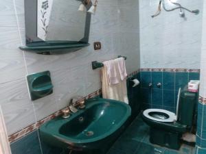 Koupelna v ubytování Amenophis Hotel