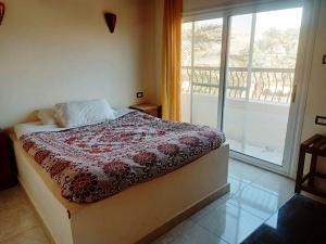 Postel nebo postele na pokoji v ubytování Amenophis Hotel