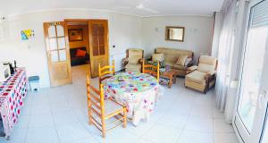 Posezení v ubytování Hostal Sol Naciente + 31 fotografií