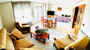 TV a/nebo společenská místnost v ubytování Hostal Sol Naciente