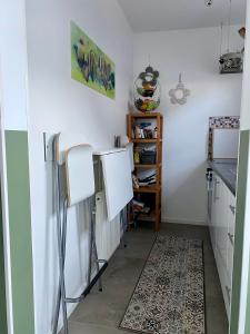 Kuchyň nebo kuchyňský kout v ubytování Ferienwohnung Jolene + 8 fotografií