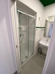 a bathroom with a shower and a sink at ILPOSTOGIUSTO in Torre Annunziata +40 photos