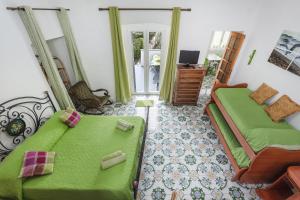 Ένα ή περισσότερα κρεβάτια σε δωμάτιο στο Green Island Apartment