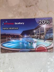 a picture of a swimming pool in a building at Chaty Mocarnego Szaflary in Szaflary