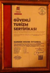 a framed sign for a garden house istanbul at Garden House Hotel - Special Class in Istanbul
