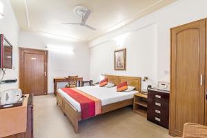 Girisadan Boutique Stay客房内的一张或多张床位