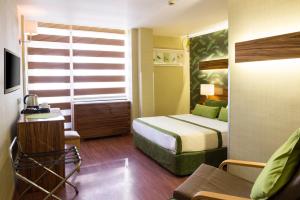 a hotel room with a bed and a window at Hotel Buyuk Keban in Istanbul