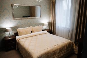 Кровать или кровати в номере Vallery Guest House