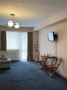 TV/trung tâm giải trí tại Royal's apartment gudauri