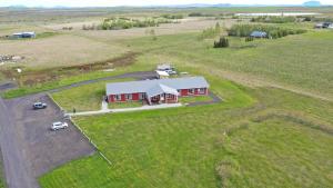 an aerial view of a house in a field at Loa's Nest in Hella