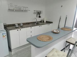مطبخ أو مطبخ صغير في Pensión Playa