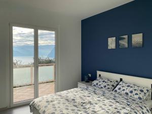 Postel nebo postele na pokoji v ubytování Happy Guest Apartments - Blue Apartment