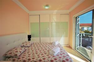 A bed or beds in a room at Villa Lovisi