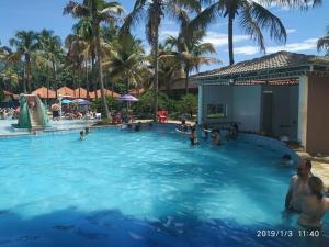 a group of people in a large swimming pool at CAMPO BELO RESORT in Presidente Prudente