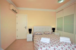 A bed or beds in a room at Villa Lovisi