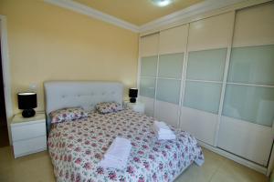 A bed or beds in a room at Villa Lovisi