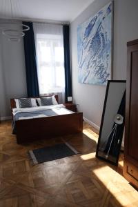 Łóżko lub łóżka w pokoju w obiekcie Old Town Studio