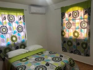 Tempat tidur dalam kamar di Hotel Galsi