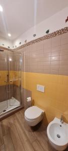 a bathroom with a toilet and a shower and a sink at Stella di Rio 5 terre riomaggiore in Riomaggiore