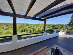 uma vista da varanda de uma casa em Herdade de Vale Maceiras em Santiago do Cacém