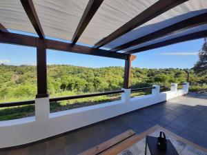 a view from the balcony of a house at Herdade de Vale Maceiras in Santiago do Cacém