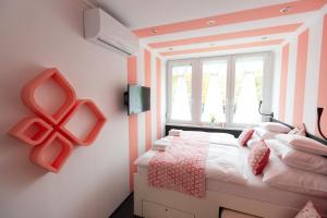 Postel nebo postele na pokoji v ubytování Flame Luxus Apartman
