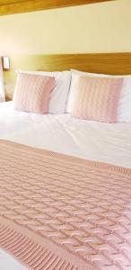 Ένα ή περισσότερα κρεβάτια σε δωμάτιο στο Pousada Villa Di Carpi