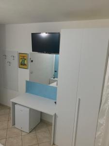 TV a/nebo společenská místnost v ubytování Borgo Piccolo