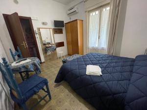 Postel nebo postele na pokoji v ubytování Hotel Europa