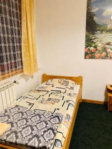Posteľ alebo postele v izbe v ubytovaní U Sobali