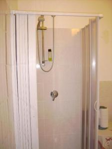 a shower in a bathroom with a shower curtain at AZIENDA AGRICOLA 25 PONTI in Gaeta +34 photos
