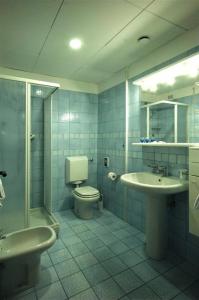 Phòng tắm tại IHR Residence Hotel Le Terrazze